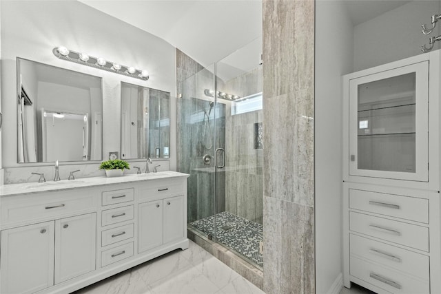 bathroom with vanity and walk in shower