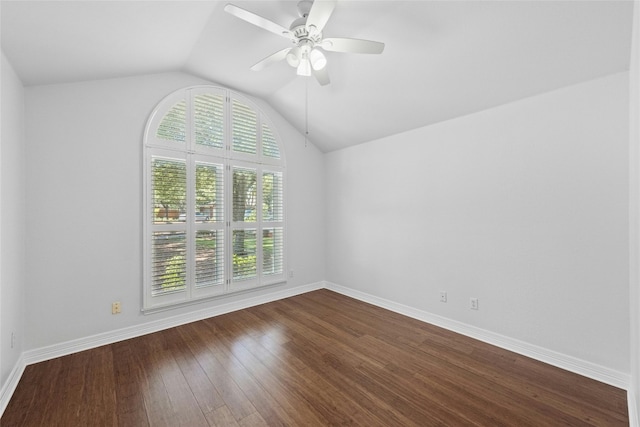 spare room featuring ceiling fan, hardwood / wood-style floors, and lofted ceiling