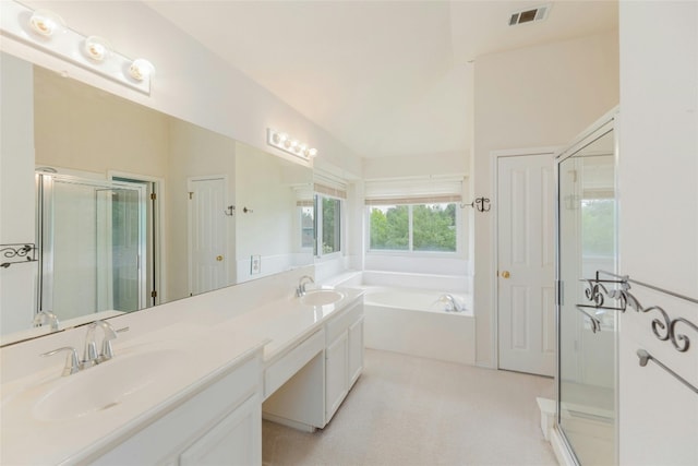 bathroom featuring vanity, vaulted ceiling, and plus walk in shower