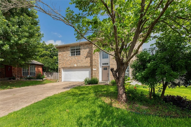 view of front of house with a garage and a front lawn