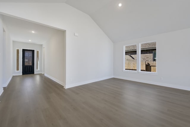 202 Grand Canyon Way, Kyle, TX 78640 - empty room featuring recessed lighting, baseboards, vaulted ceiling, and dark wood finished floors