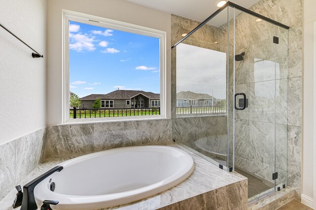 8508 Dongan Dr, Austin, TX 78744 - full bath featuring a bath and a stall shower