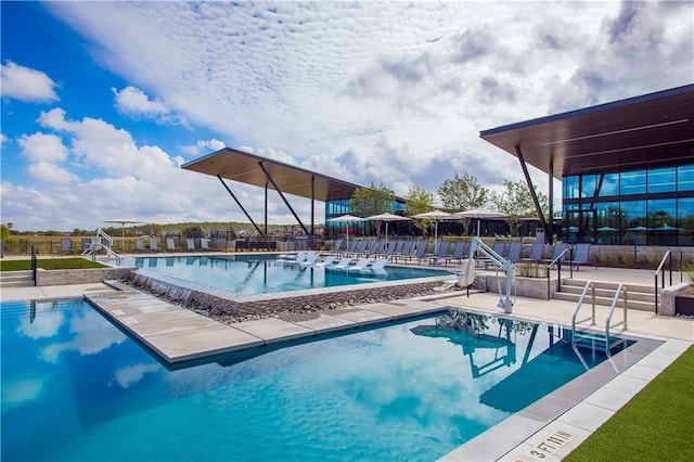 view of swimming pool featuring a patio