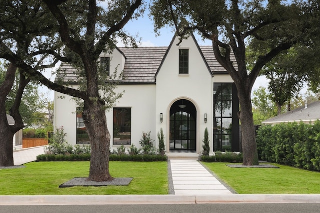 1510 Pease Rd, Austin, TX 78703 - view of front of house featuring stucco siding and a front yard