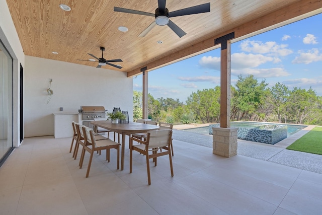 view of patio / terrace with ceiling fan, a grill, and a pool with hot tub