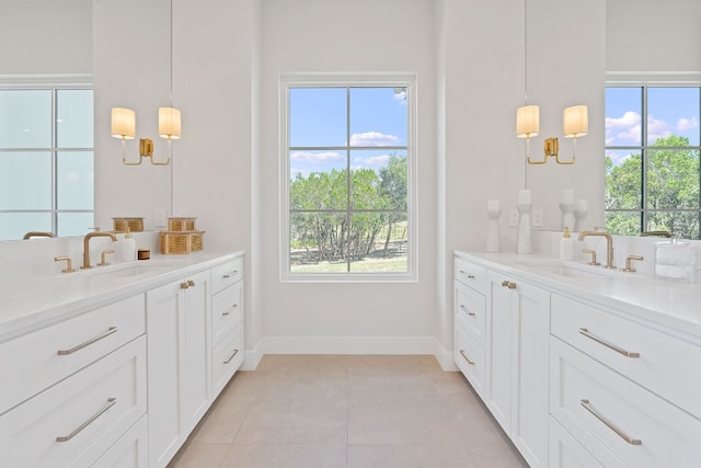 bathroom featuring tile patterned flooring and vanity