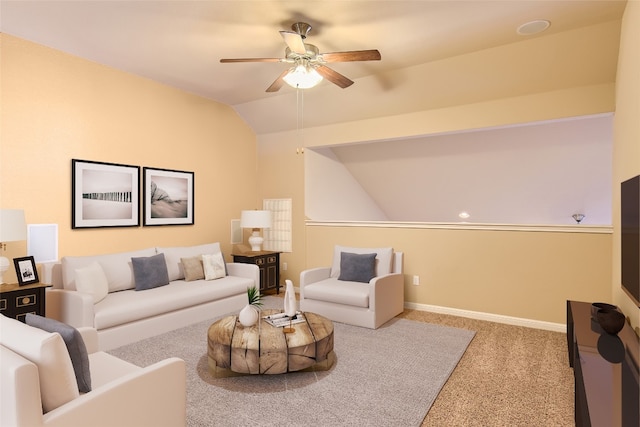 carpeted living room featuring vaulted ceiling and ceiling fan