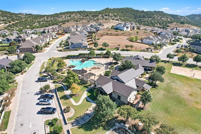 birds eye view of property with a residential view and a mountain view