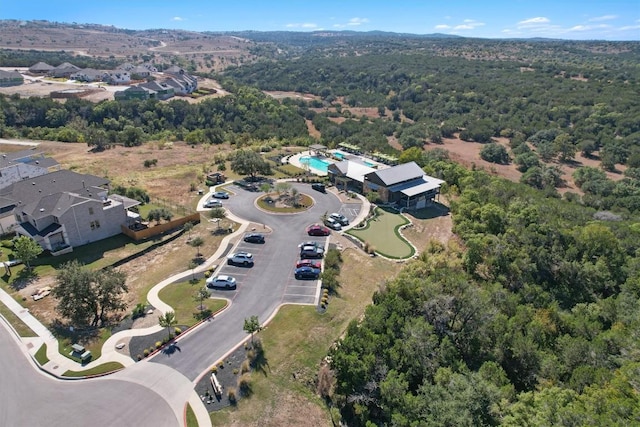 drone / aerial view with a view of trees