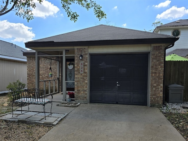 single story home with a garage