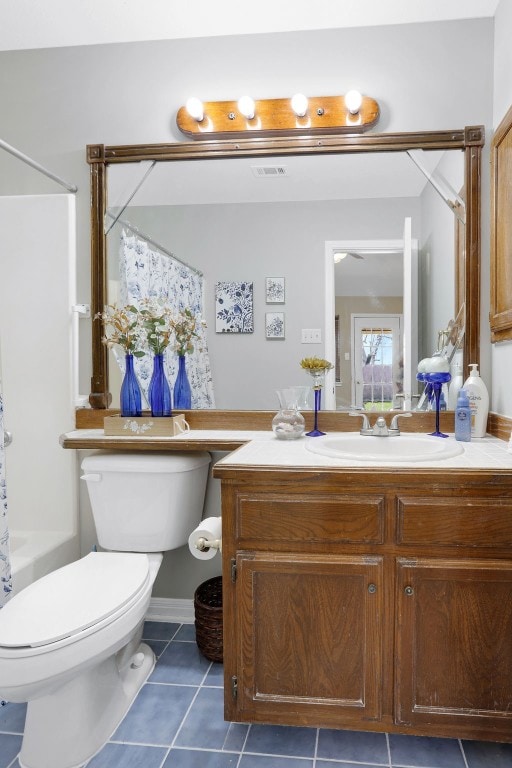 full bathroom with shower / bathtub combination with curtain, tile patterned floors, vanity, and toilet