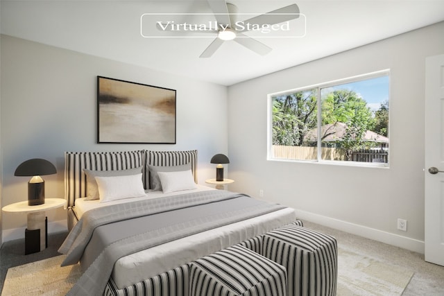 carpeted bedroom featuring ceiling fan