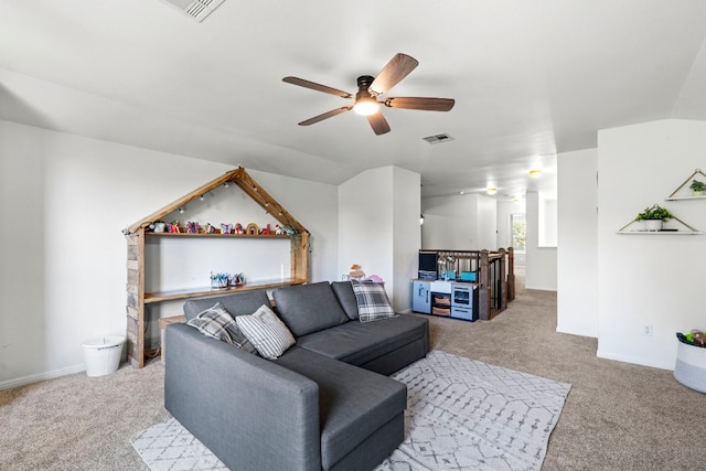 7709 Little Deer Trl, Georgetown, TX 78628 - living area with baseboards, visible vents, a ceiling fan, and carpet flooring