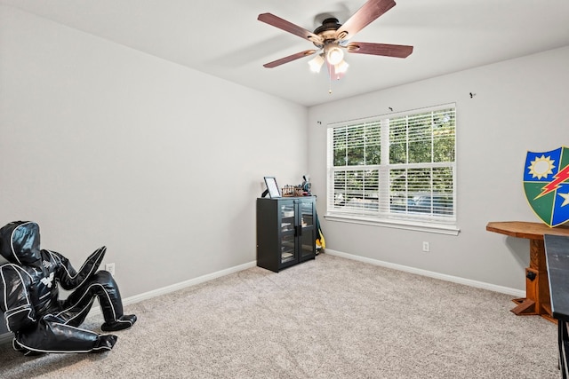 7709 Little Deer Trl, Georgetown, TX 78628 - miscellaneous room featuring baseboards, a ceiling fan, and carpet flooring