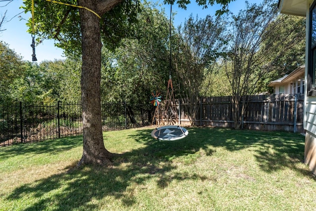 view of yard with a fenced backyard