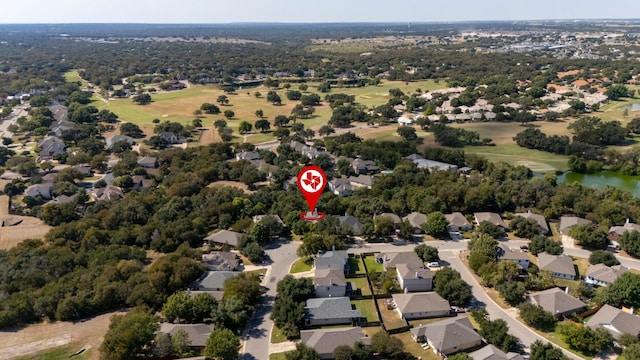 birds eye view of property featuring a residential view and a water view