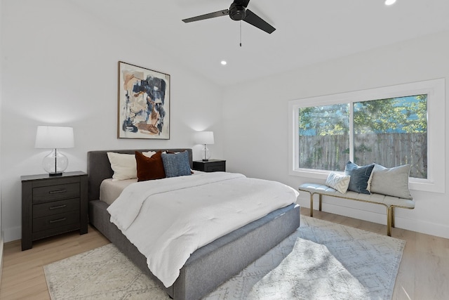 bedroom with light wood-type flooring and ceiling fan