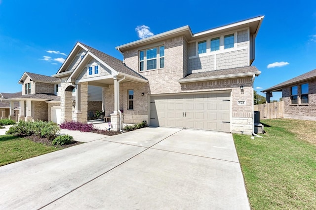 view of front facade featuring a garage and a front lawn