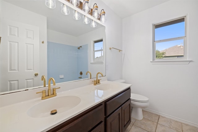 bathroom with a shower, toilet, vanity, and tile patterned flooring