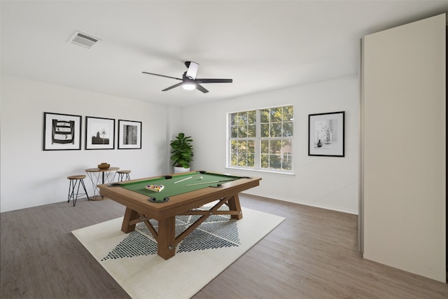 recreation room with ceiling fan, hardwood / wood-style floors, and billiards