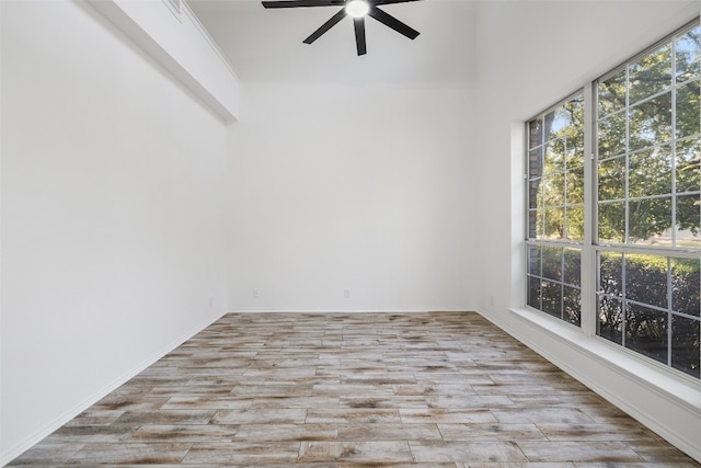 spare room with ceiling fan