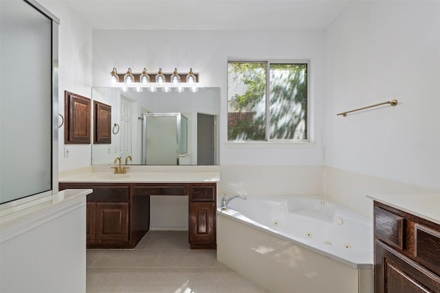 bathroom featuring vanity, tile patterned flooring, and plus walk in shower