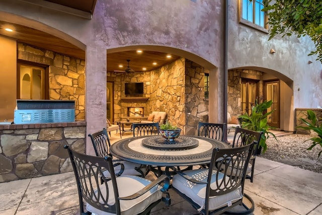 view of patio / terrace with a fireplace