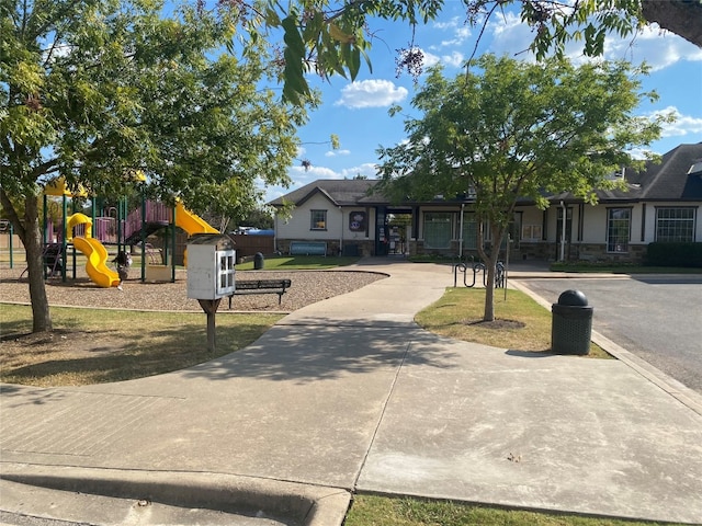 view of front facade with a playground