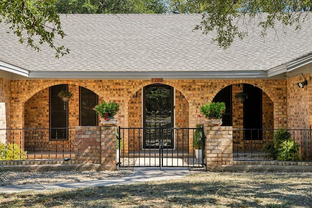 property entrance with covered porch