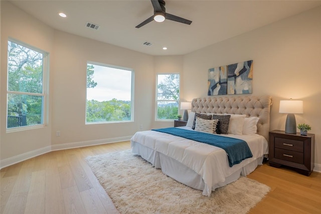 bedroom featuring ceiling fan and light wood-type flooring