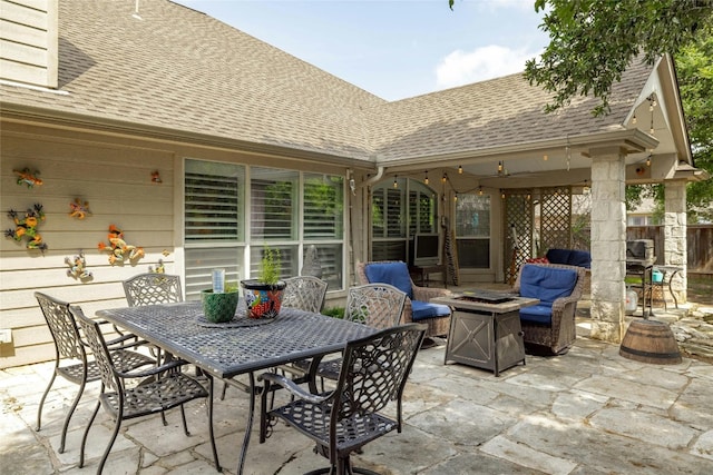 view of patio with an outdoor fire pit