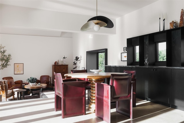 dining area with concrete floors