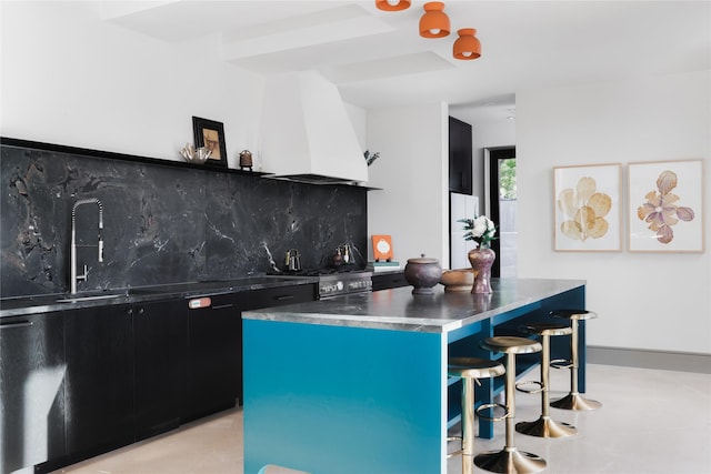 kitchen featuring custom exhaust hood, a center island, white fridge, a breakfast bar, and backsplash