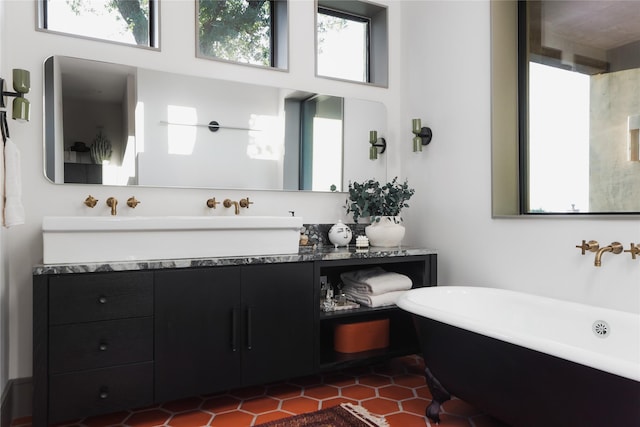 bathroom with a bathtub and vanity