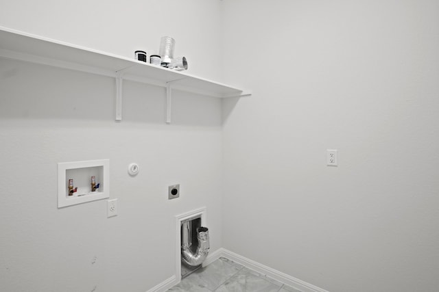 clothes washing area featuring hookup for an electric dryer, hookup for a gas dryer, and washer hookup