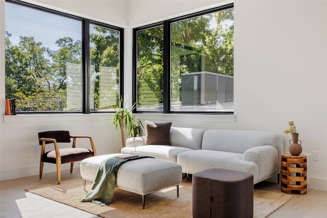 sunroom / solarium featuring a healthy amount of sunlight