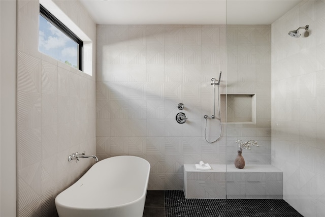 bathroom with tile patterned floors, independent shower and bath, and tile walls