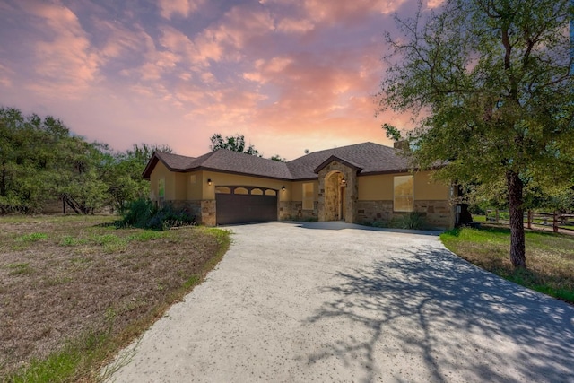 view of front of house with a garage