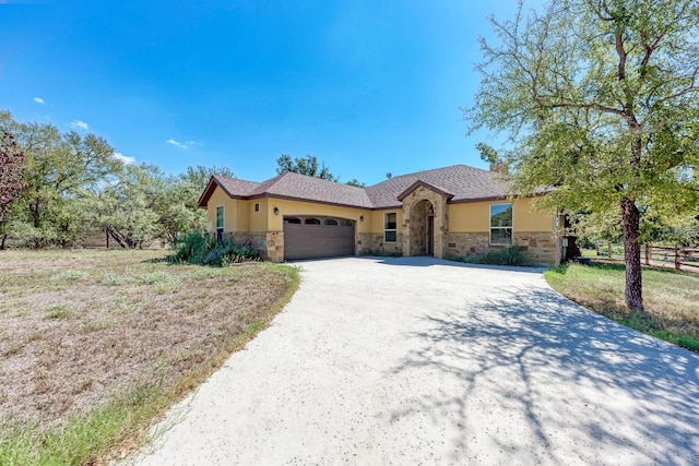 ranch-style home with a garage