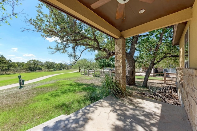 view of patio with ceiling fan