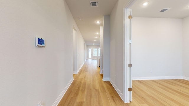 hallway featuring light wood-type flooring