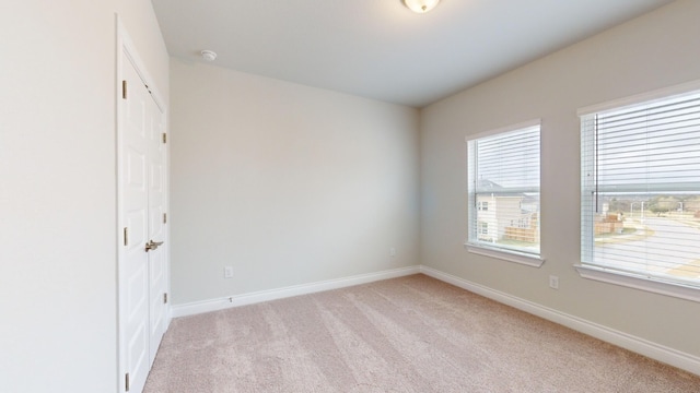 empty room with light carpet