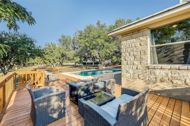 3110 Point Cv, Lago Vista, TX 78645 - wooden terrace featuring an outdoor fire pit and an outdoor pool