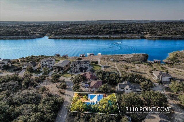 3110 Point Cv, Lago Vista, TX 78645 - aerial view of property's location with a large body of water and property parcel outlined