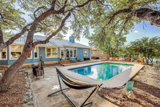 view of pool with a patio area