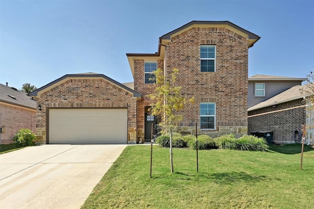 front of property featuring a front lawn and a garage