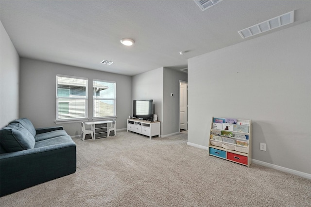 living room with light colored carpet