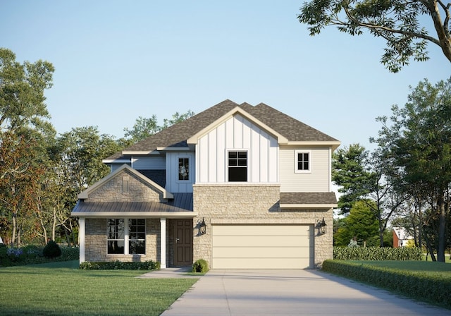 view of front of house featuring a front yard and a garage