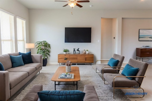 living room featuring ceiling fan