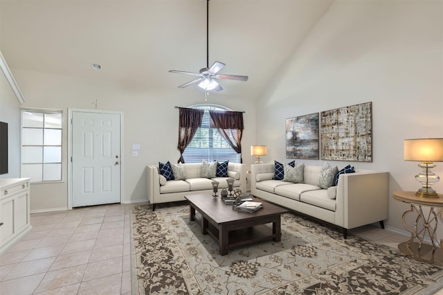 living room with light tile patterned floors, ceiling fan, and high vaulted ceiling